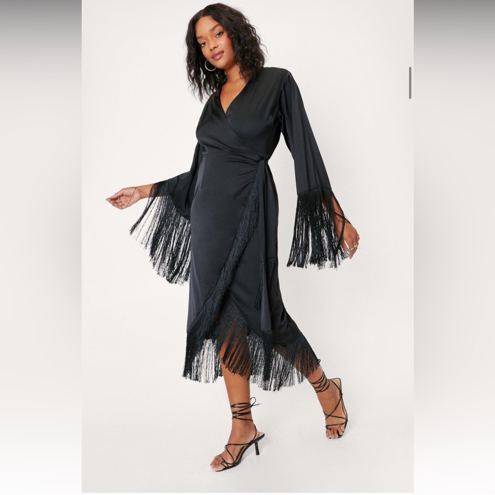 Black wrap dress with fringe.